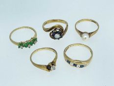 FIVE 9CT GOLD RINGS set with various gems including diamonds, sapphires, opal, diamond simulant ETC,