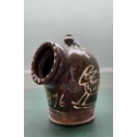 A VICTORIAN DATED ENGLISH SLIPWARE POTTERY SALT 'PIG' deep brown glaze with slip decoration of two