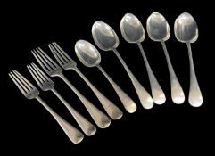PART SET OF GEORGE V SILVER FLATWARE, comprising four serving spoons, dessert spoon and four