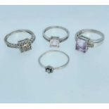 FOUR 9CT WHITE GOLD DRESS RINGS set with various semi-precious gems, 12.0gms gross Provenance: