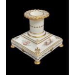 AN ENGLISH PORCELAIN CANDLESTICK circa 1820-1830, square stepped based to a cylindrical nozzle