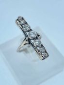 WHITE METAL DIAMOND RING having five graduated diamonds, 0.5cts overall approx., 3.1gms