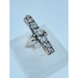 WHITE METAL DIAMOND RING having five graduated diamonds, 0.5cts overall approx., 3.1gms