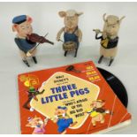 SCHUCO CLOCKWORK 'THREE LITTLE PIGS', c.1930s, felt covered pigs wearing original felt clothes and