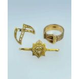 9CT GOLD JEWELLERY comprising 9ct gold wishbone ring, 9ct gold buckle ring and a 9ct gold bar brooch