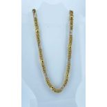 18CT GOLD FANCY LINK CHAIN, 43cms long, stamped '750', 30.7gms, in Dewi Griffiths jewellery box