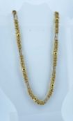 18CT GOLD FANCY LINK CHAIN, 43cms long, stamped '750', 30.7gms, in Dewi Griffiths jewellery box