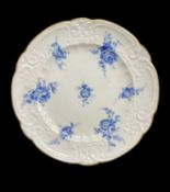 A NANTGARW PORCELAIN PLATE circa 1817-1820, of lobed and moulded form, painted with seven blue