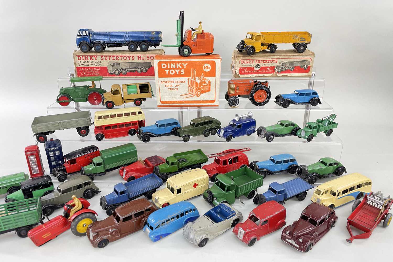 ASSORTED VINTAGE PLAYWORN DIE-CAST VEHICLES comprising boxed Dinky Toys Coventry Climax Fork Lift