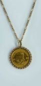 1984 1/10 OZ GOLD KRUGERRAND in 9ct gold mount on 9ct gold chain, 7.0gms Provenance: private