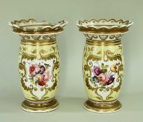 PAIR OF PORCELAIN SPILL HOLDERS of baluster form and having pierced crowns and spreading feet,