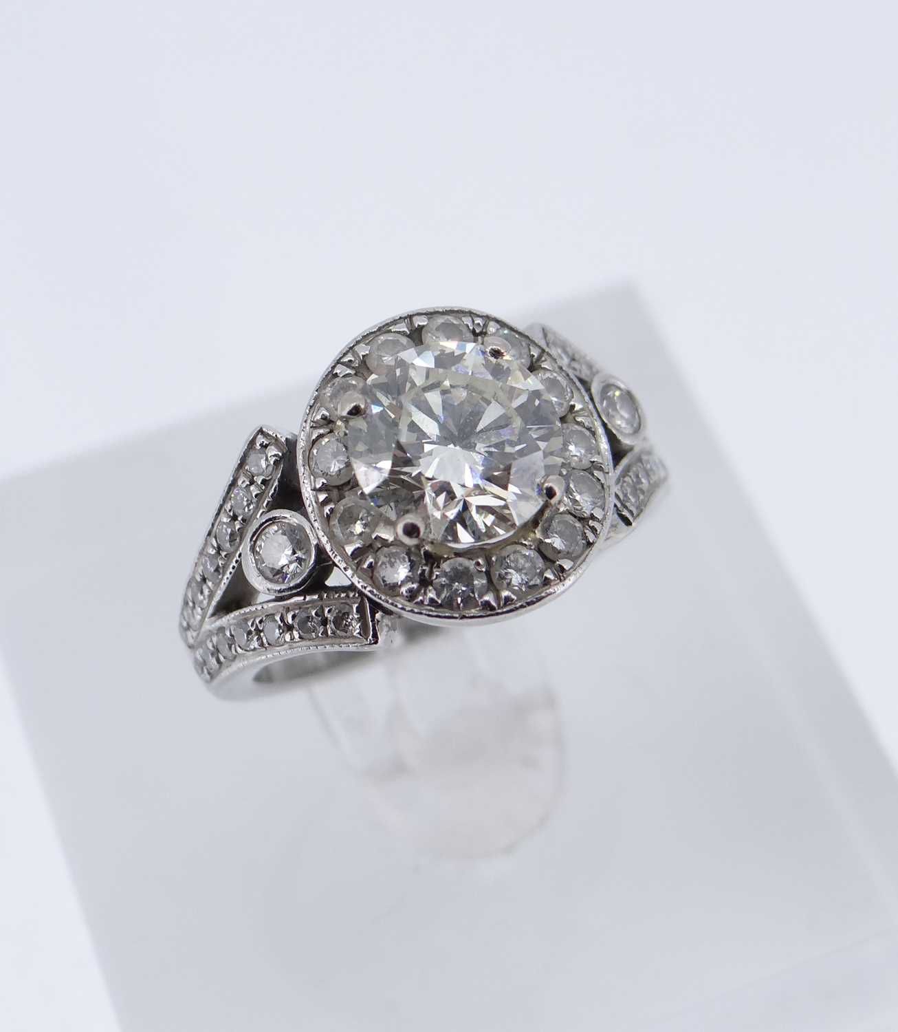 MODERN PLATINUM DIAMOND ENCRUSTED ENGAGEMENT RING & MATCHING WEDDING BAND, the central stone - Image 2 of 8