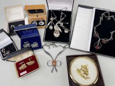 THREE SILVER NECKLACES, comprising amber set example, agate set example and another of floral