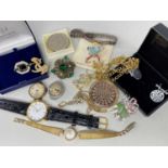 ASSORTED COSTUME JEWELLERY comprising lovespoon pendant on chain, Queen Mother commemorative coin,