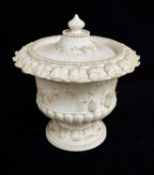 A RARE SWANSEA DILLWYN & CO BISCUIT PORCELAIN VASE & COVER circa 1814-1817, of urn-shape with lid,