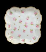 A NANTGARW PORCELAIN SQUARE DISH circa 1818--1820, of rounded and fluted form with gilded dentil rim