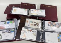 ASSORTED ROYAL MAIL FIRST DAY COVERS, in red and brown vinyl albums (approximately 263)