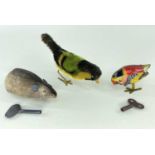 SCHUCO CLOCKWORK TOYS comprising mohair bird, velvet mouse, together with tin plate pecking bird,