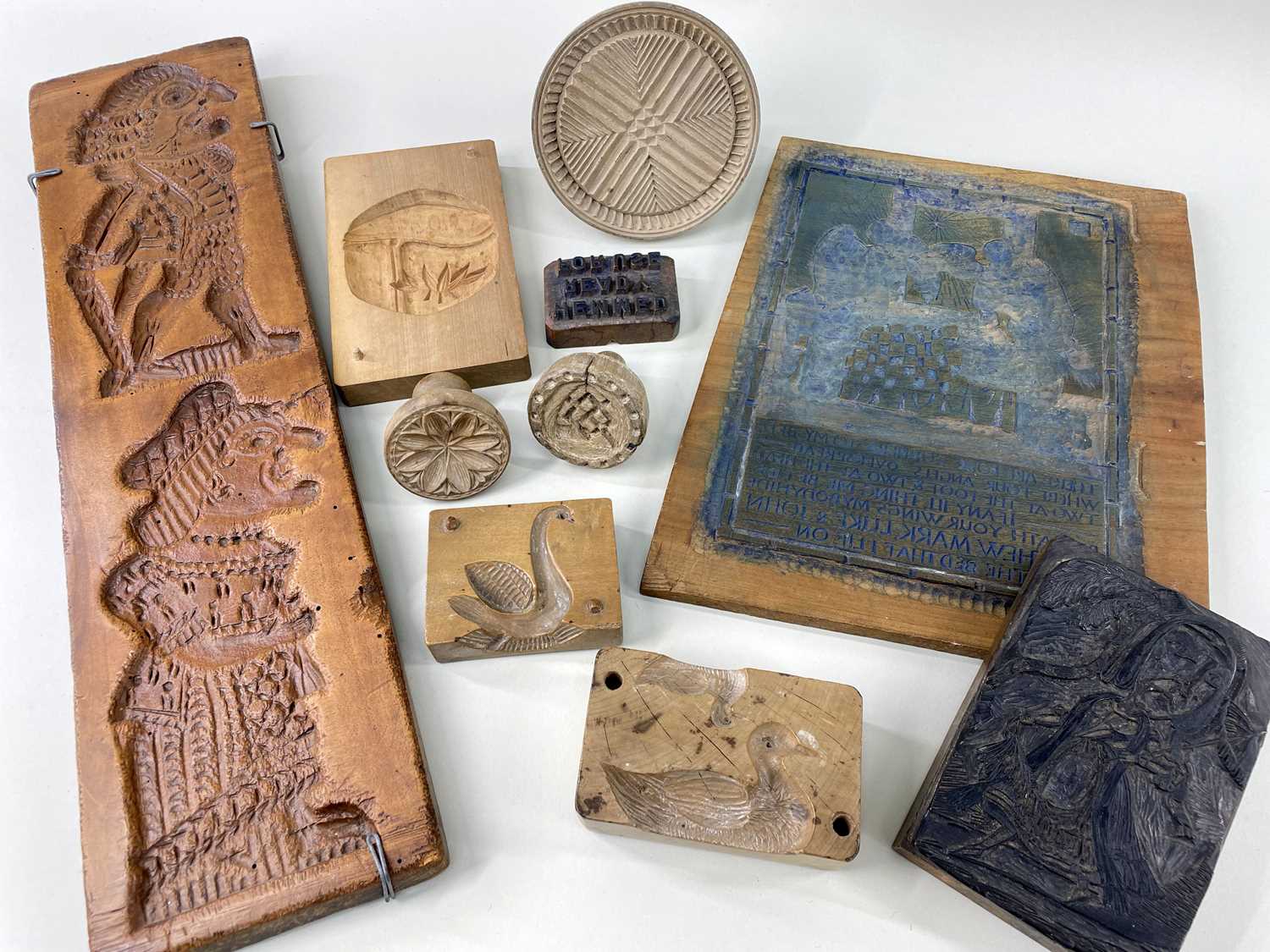 GROUP OF WOODEN MOULDS / PRINTING BLOCKS including 19th Century Mr & Mrs Punch gingerbread mould,