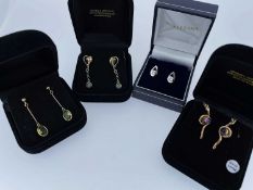 FOUR BOXED PAIRS OF GOLD EARRINGS comprising a piar of 18ct white gold diamond earrings and three