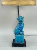 CHINESE BUDDHISTIC LION PORCELAIN TABLE LAMP, turquoise glazed, one paw resting on a playful cub,