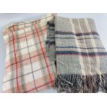 TWO VINTAGE WOOLLEN BLANKETS chequered, one with fringe