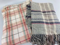 TWO VINTAGE WOOLLEN BLANKETS chequered, one with fringe