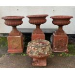 SET THREE PAINTED COMPOSITION STONE GARDEN URNS, 50cm diam x 83cm h, and another foliate moulded (