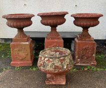 SET THREE PAINTED COMPOSITION STONE GARDEN URNS, 50cm diam x 83cm h, and another foliate moulded (