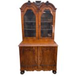 DUTCH WALNUT CABINET, the upper portion with double domed cornice, glazed panel doors, on an