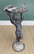 LATE 18TH CENTURY LEAD FIGURAL BIRD BATH, of a standing putto holding a large clam shell above his