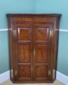 GEORGE III MAHOGANY HANGING CORNER CUPBOARD, moulded cornice over crossbanded frieze above triple