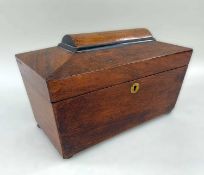 19TH CENTURY MAHOGANY TEA CADDY, of sarcophagus form, with part ebonised top, fitted interior, 29.