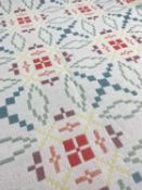 WELSH WOOLLEN REVERSIBLE TAPESTRY BLANKET with fringes to both ends, repeating geometric patterns in