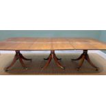 LATE GEORGE III MAHOGANY TRIPLE PEDESTAL DINING TABLE, reeded edge with rounded corners, turned
