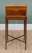 GEORGE III MAHOGANY TEA CADDY, on later stand with tapering square legs joined by X-stretcher, 15