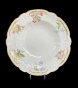 NANTGARW PORCELAIN CENTRE DISH circa 1817-1820, cruciform, typically moulded with c-scrolls, flowers