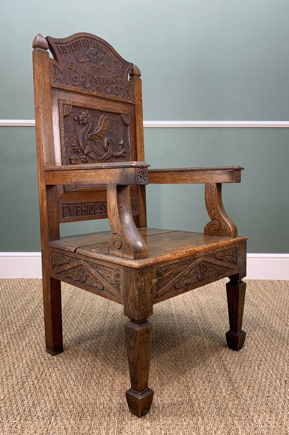 1907 WELSH EISTEDDFOD OAK ARM CHAIR, square panel to back with dragon and inscribed 'Y DDRAIG COCH A - Image 4 of 5