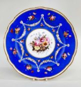 NANTGARW PORCELAIN PLATE IN ROYAL BLUE GROUND circa 1818-1820, of slightly lobed form, central