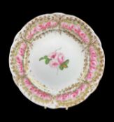 NANTGARW PLATE DECORATED WITH ROSES circa 1817-1820, in the Derby style centred with three roses and