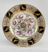 RARE NANTGARW PORCELAIN PLATE circa 1818-1820, the interior decorated with a formal arrangement of