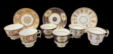 THREE SWANSEA PORCELAIN SET-PATTERN TRIOS comprising (1) Pattern No.248 with pink roses in octagonal