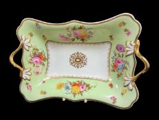 SWANSEA PORCELAIN TWIG-HANDLED DISH circa 1817-1820 with lime-green reserve border, painted with