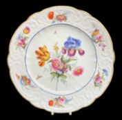 GOOD NANTGARW PORCELAIN PLATE circa 1818, of lobed form, typically moulded with c-scrolls, forget-