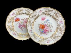 PAIR OF NANTGARW PORCELAIN PLATES circa 1818-1820, of lobed form, the border richly gilded with