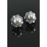 PAIR OF WHITE METAL PEARL & DIAMOND CLUSTER EARRINGS, the central pearls (8mm diameter) each