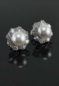 PAIR OF WHITE METAL PEARL & DIAMOND CLUSTER EARRINGS, the central pearls (8mm diameter) each