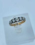 18CT GOLD FIVE STONE DIAMOND RING, the five graduated stone totalling 0.5cts approx., engraved 'From