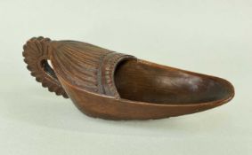 19TH CENTURY CARVED PAP BOAT, probably French Cherry wood, decorated with leaf motifs, and shallow