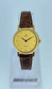 18CT GOLD OMEGA DE VILLE LADIES' WRISTWATCH, the dial having pointed baton hour markers, stamped '